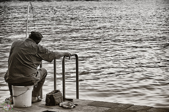 Fisherman on the promenade from Varenna to Olivedo