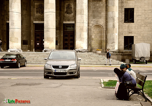 Talking in front of the Palace of Science and Culture