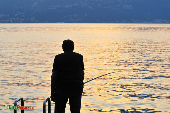 Fisherman on the promenade from Varenna to Olivedo